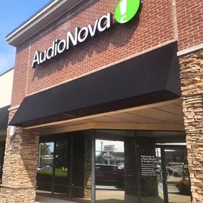 Exterior close up photo of the front entrance for AudioNova hearing clinic in Springfield, MO
