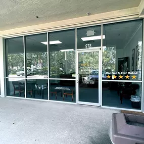 Exterior photo of the front door for AudioNova hearing clinic in Port St. Lucie, FL
