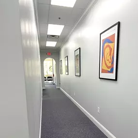 Interior photo of the hallway for AudioNova hearing clinic in Port St. Lucie, FL