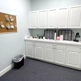 Interior photo of the hearing aid lab area for AudioNova hearing clinic in Port St. Lucie, FL