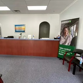 Interior photo of the reception desk for AudioNova hearing clinic in Port St. Lucie, FL