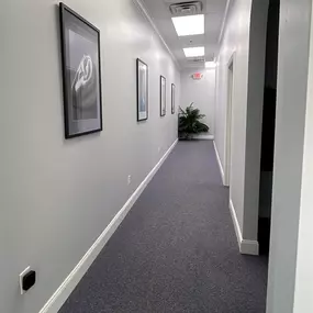 Interior photo of the hallway for AudioNova hearing clinic in Port St. Lucie, FL