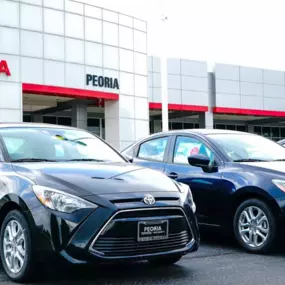 Toyota cars parked outside Peoria Toyota dealership