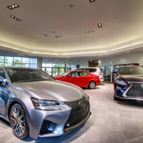 Lexus of Peoria dealership showroom interior with vehicles on display