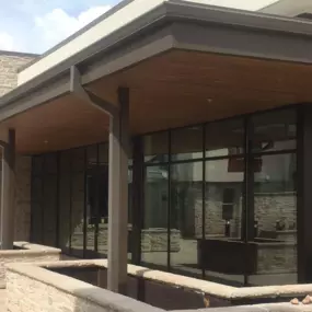 rain gutters installed on a commercial shopping center.