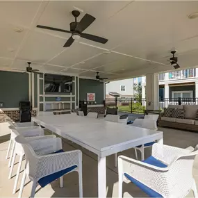 A patio with a white table