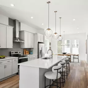 Breathtaking kitchen adjacent to casual dining