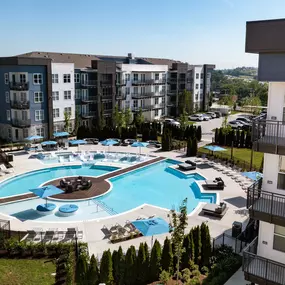 Aerial view of resort-style pool next to buildings at Camden West Nashville apartments in Nashville, TN