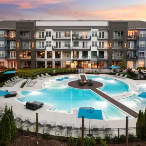 Resort-style pool at twilight at Camden West Nashville apartments in Nashville, TN