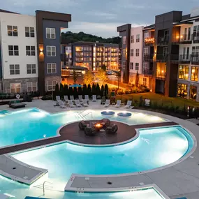 Aerial view of resort-style pool at twilight at Camden West Nashville apartments in Nashville, TN