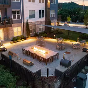 Aerial view of outdoor kitchen at twilight at Camden West Nashville apartments in Nashville, TN