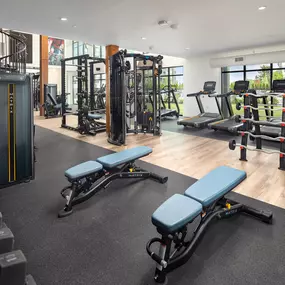 Free weights and machines in the 24-hour fitness center at Camden West Nashville apartments in Nashville, TN