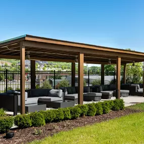 Cabana seating next to the sand volleyball court at Camden West Nashville apartments in Nashville, TN