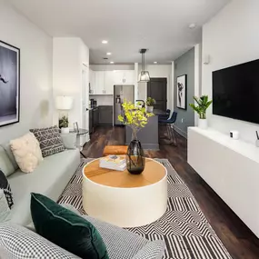 Living room with wood-style flooring at Camden West Nashville apartments in Nashville, TN