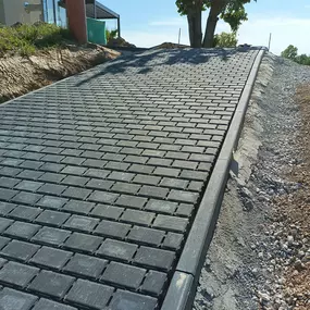 Bild von T&P Meerane GmbH | Bagger • Pflastern • Hausmeisterdienst • Grünpflege