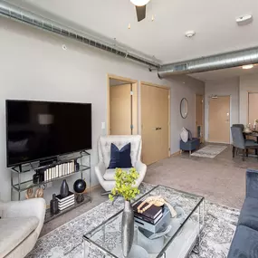 Furnished living room with dining area