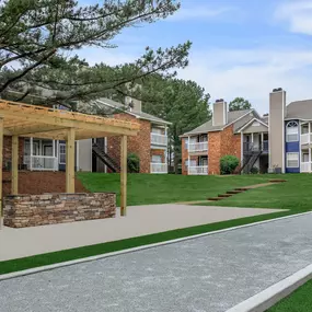 community with a walkway and grass