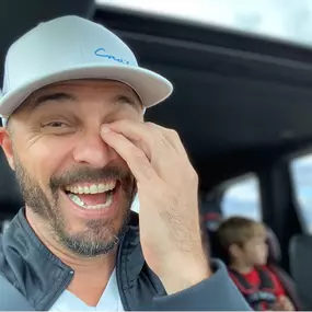 Road Trip Vibes
A candid laugh, a cozy cap, and a little one in the backseat—life’s simple moments keep you grounded.
