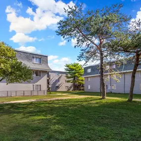 Lush green grass in front of the property building