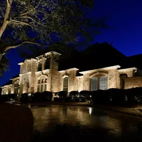 Elevate your home's nighttime curb appeal with professionally designed landscape and architectural lighting that highlights your property’s best features.