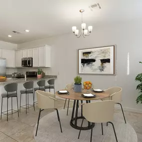 Dining area and kitchen with room for bar top seating
