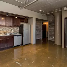 Open space kitchen with stainless steel appliances