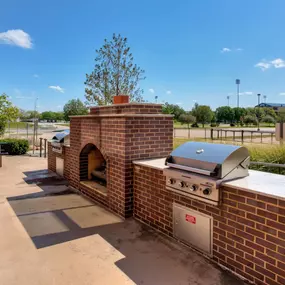 Outdoor space with grilling stations