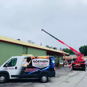 Northern Comfort Systems truck outside of a building