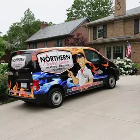 Northern Comfort Systems van outside a house