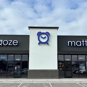 This is our beautiful store front! The Snooze clock is our cherry on top! If you don't Snooze, you lose!