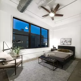 Bedroom with sealed concrete flooring