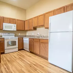 Kitchen with appliances and storage space