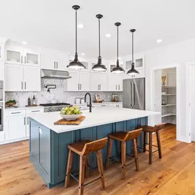 Gourmet kitchens with large center islands and plenty of storage