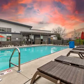 our apartments have a large swimming pool and lounge chairs