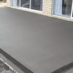 Enhance your backyard with a beautiful new concrete patio.