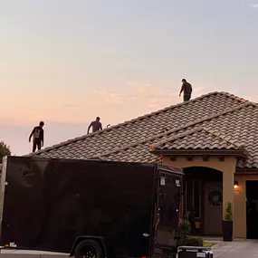 R1 Roofing & Exteriors – Utah crew performing tile roof installation in Utah at sunset