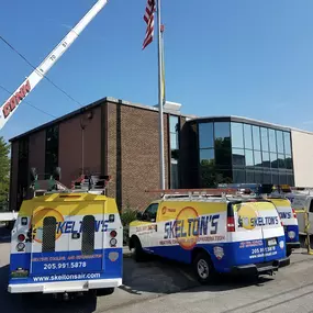 Skelton's Heating, Cooling & Plumbing pickup trucks in the field