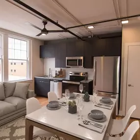 A modern kitchen with a dining table set for two