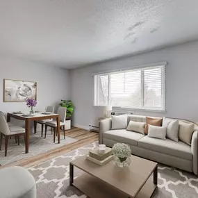 A well-lit living room with a dining table and a couch
