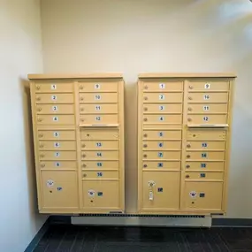Two large filing cabinets with numbered drawers are standing next to each other