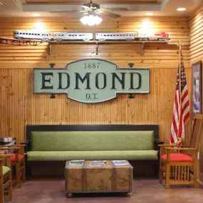 Inside view of the Edmond dental clinic's waiting room with the Edmond signage.