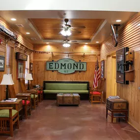 Wide shot of the interior of the Edmond dental clinics waiting room and reception area.