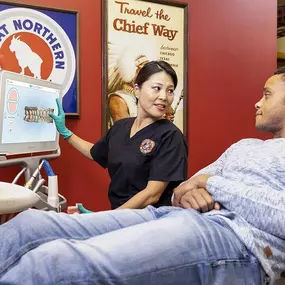 A young man gets consulted on his dental care at dental depot