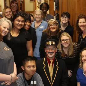 The Central OKC Dental team with Smiley