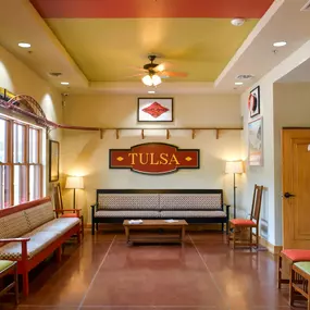 Central Tulsa's dental clinic waiting room with train themed signage