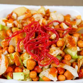 Papas locas, homemade chips with Japanese peanuts, cucumber, escuincles, lime, pork rinds, soy sauce, and Valentina sauce.
Papas locas, papas caseras con cacahuate japonés, pepino, escuincles, limón, cueritos, salsa de soya y Valentina.