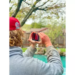 Dialing in the water balance—tech using a Taylor test kit to check and adjust pool chemistry for a safe, sparkling swim.