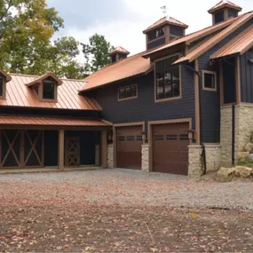 Custom metal roof installation on luxury home by R1 Roofing & Exteriors – Arizona