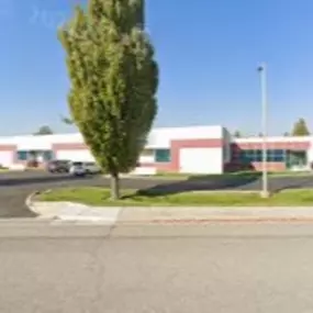 Street view of Blended Pathways' location, providing coaching and support for blended families, step-parents, and remarried couples in Post Falls, ID. Easily accessible for in-person sessions and consultations.