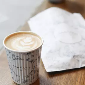 cappuccino and pastry bag